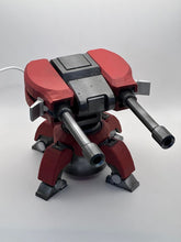 Load image into Gallery viewer, "Image of a 3D Printed Torbjörn Turret Replica from Overwatch in motion. The replica turret is made of high-quality plastic and designed to look like the in-game version. The turret is shown with its signature orange and gray color scheme, and is in mid-rotation with its barrel pointed forward. This replica is perfect for Overwatch fans and collectors who want to add a realistic and unique item to their collection."