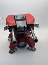 Load image into Gallery viewer, "Image of a 3D Printed Torbjörn Turret Replica from Overwatch in motion. The replica turret is made of high-quality plastic and designed to look like the in-game version. The turret is shown with its signature orange and gray color scheme, and is in mid-rotation with its barrel pointed forward. This replica is perfect for Overwatch fans and collectors who want to add a realistic and unique item to their collection."