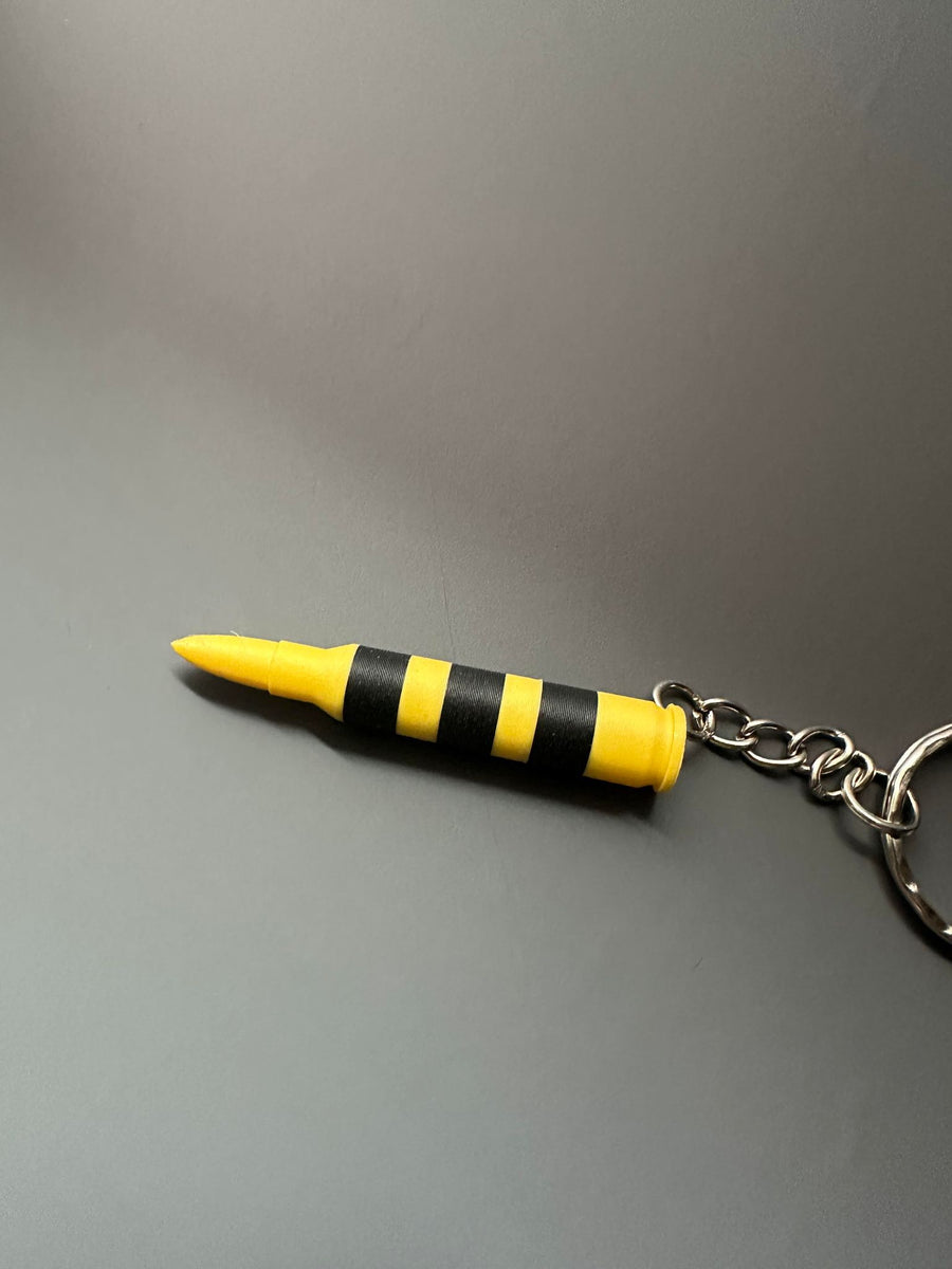 Rust 5.56 Explosive Bullet Keychain – That Prints